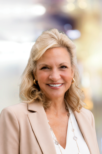 Portrait of Debra Noone, REALTOR®.